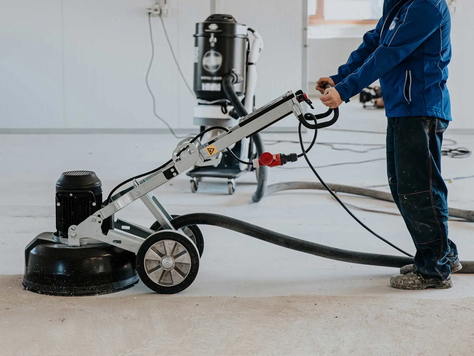 Grinding the concrete floor